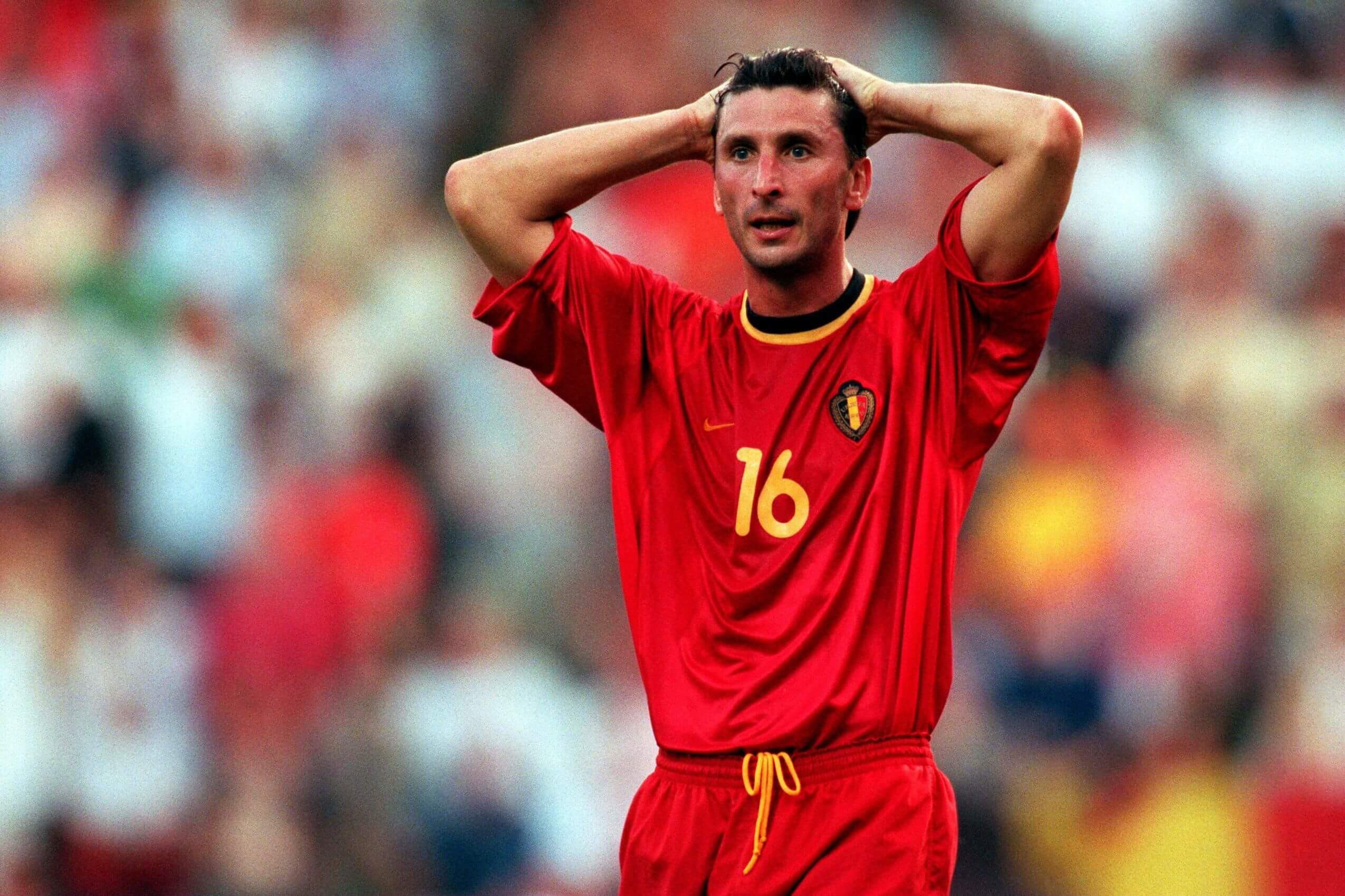 Luc Nilis of Belgium reacts as his country are knocked out of Euro 2000, prompting the Belgian FA into a complete overhaul.