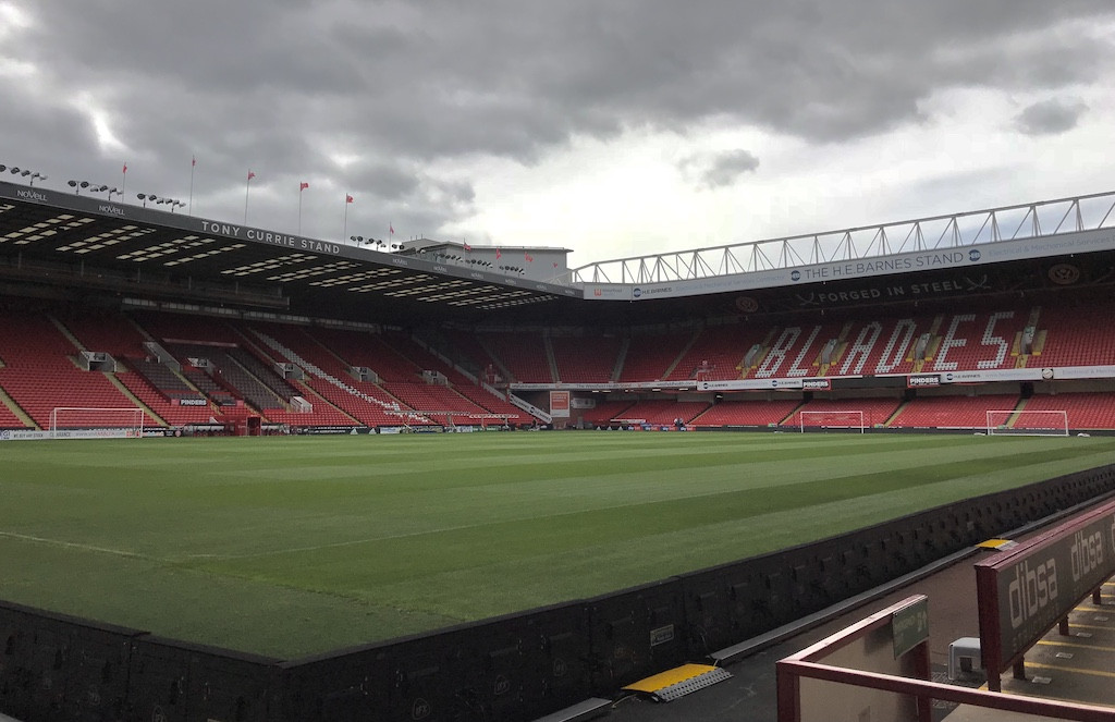 Sheffield United Fans cheering at Bramall Lane, showcasing the vibrant atmosphere