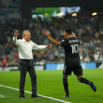 Minnesota United manager Adrian Heath, left, celebrates with Emanuel Reynoso after Reynoso's free-kick goal against Puebla in a Leagues Cup match at Allianz Field on July 23, 2023. Courtesy of Minnesota United
