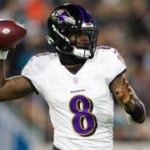 Lamar Jackson in action, running with the football