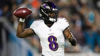 Lamar Jackson in action, running with the football