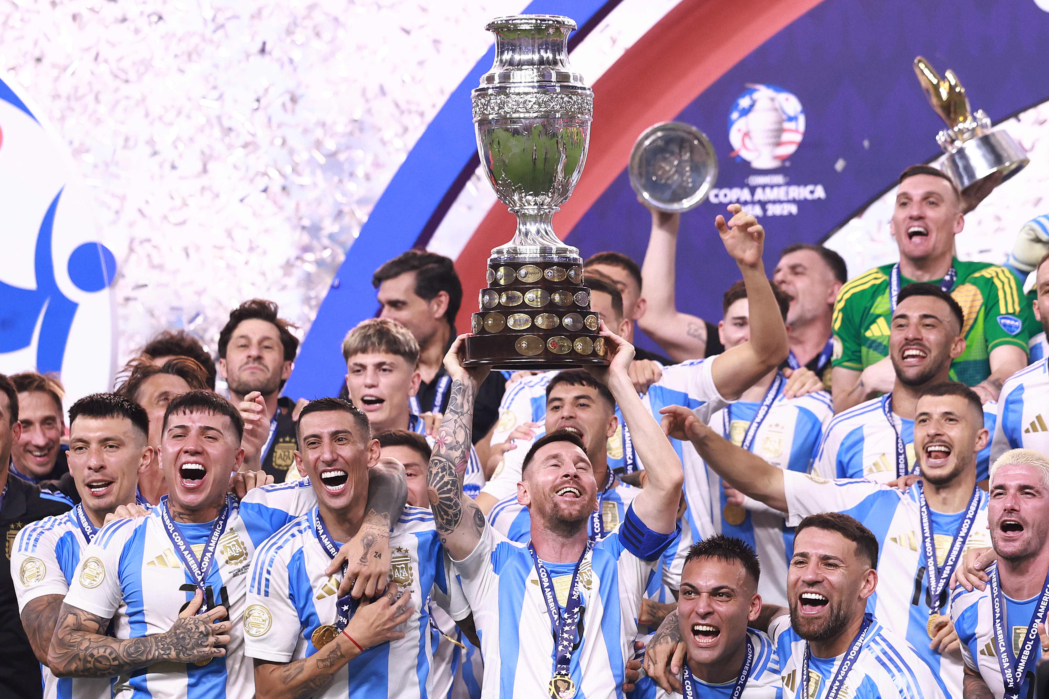 Lionel Messi lifting the Copa America trophy