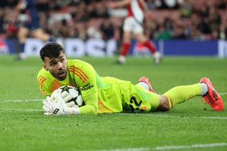 David Raya collapses on the ball against Paris Saint-Germain