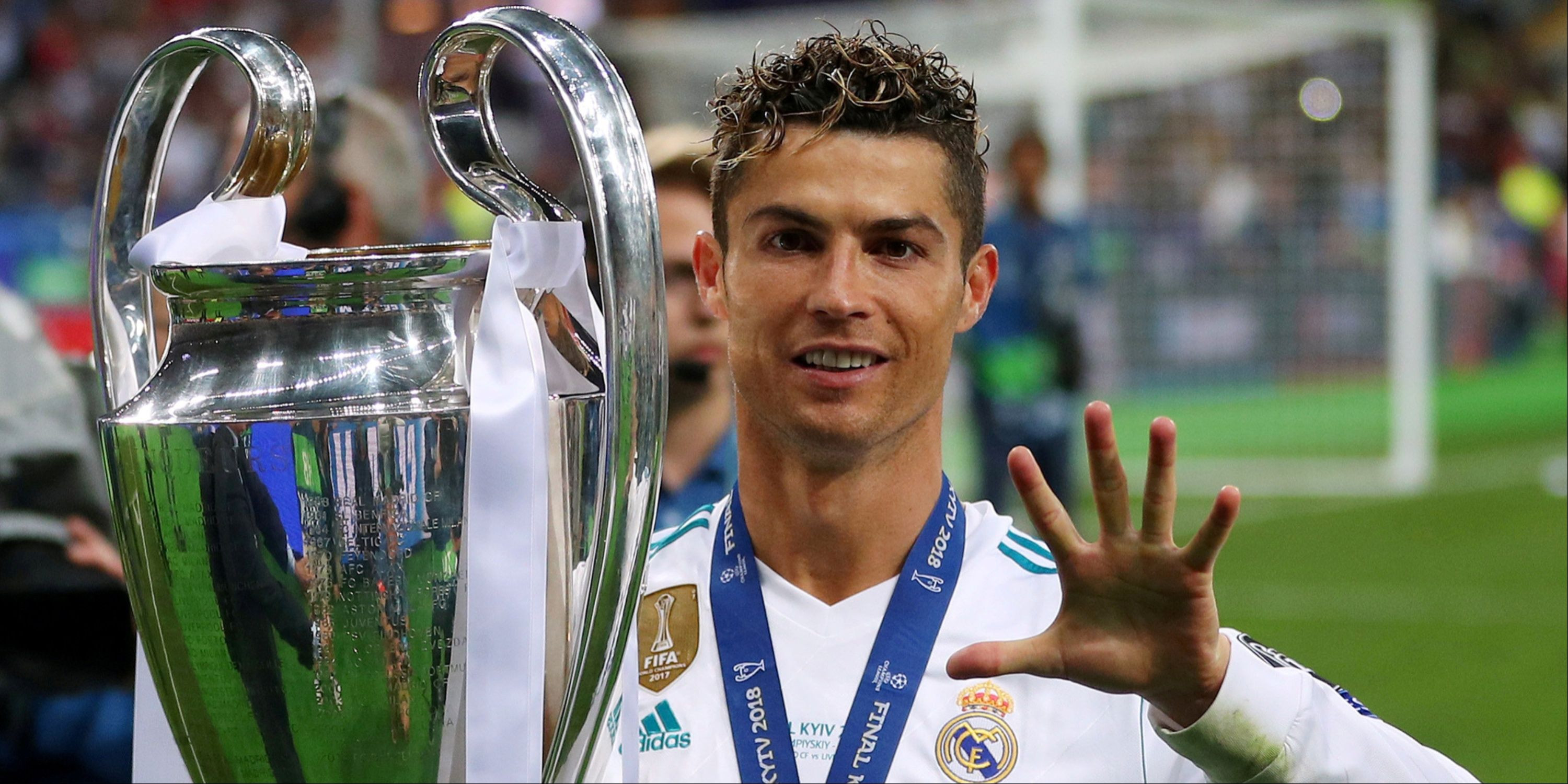 Cristiano Ronaldo celebrating with a trophy