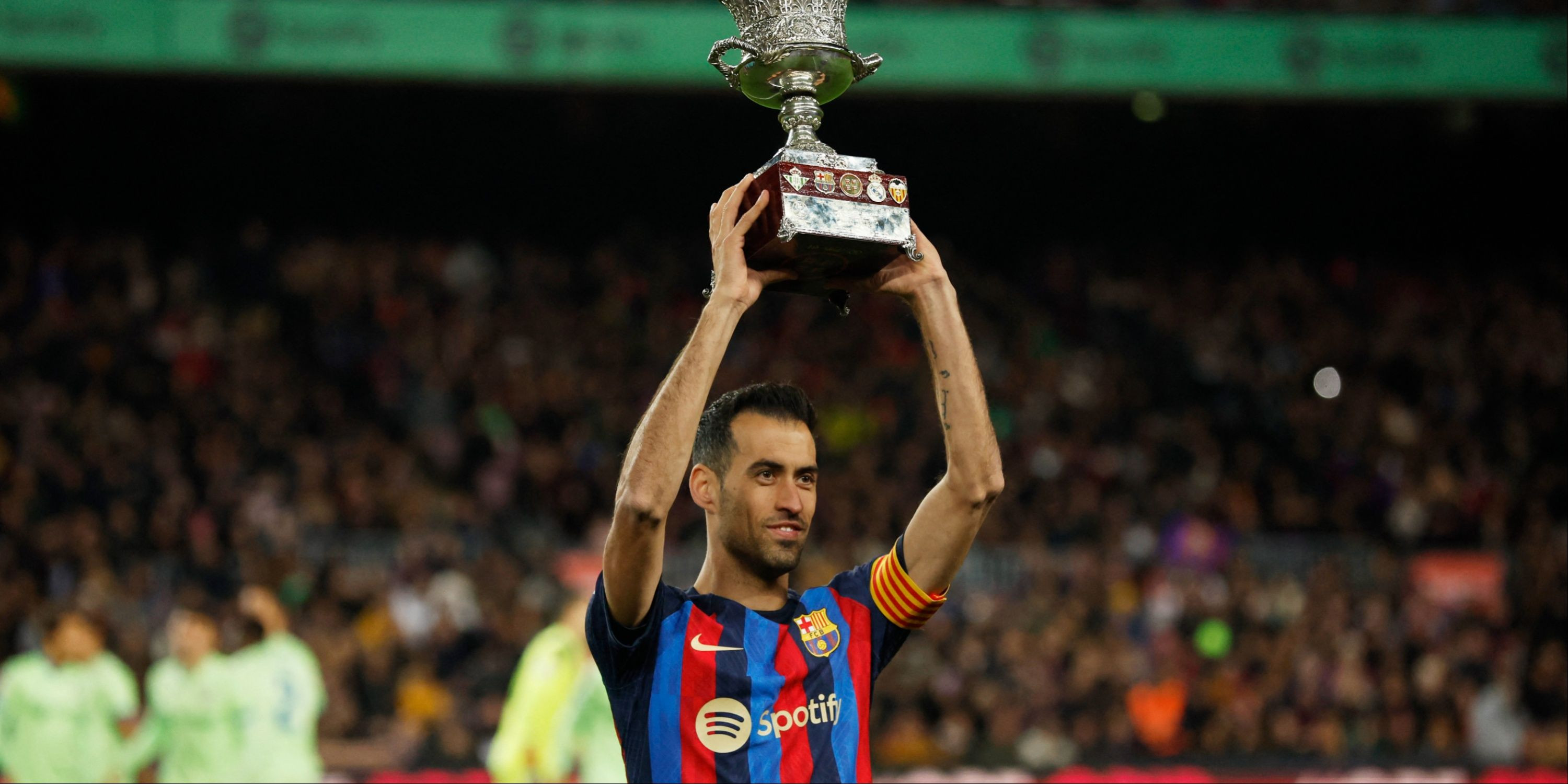Sergio Busquets with a trophy