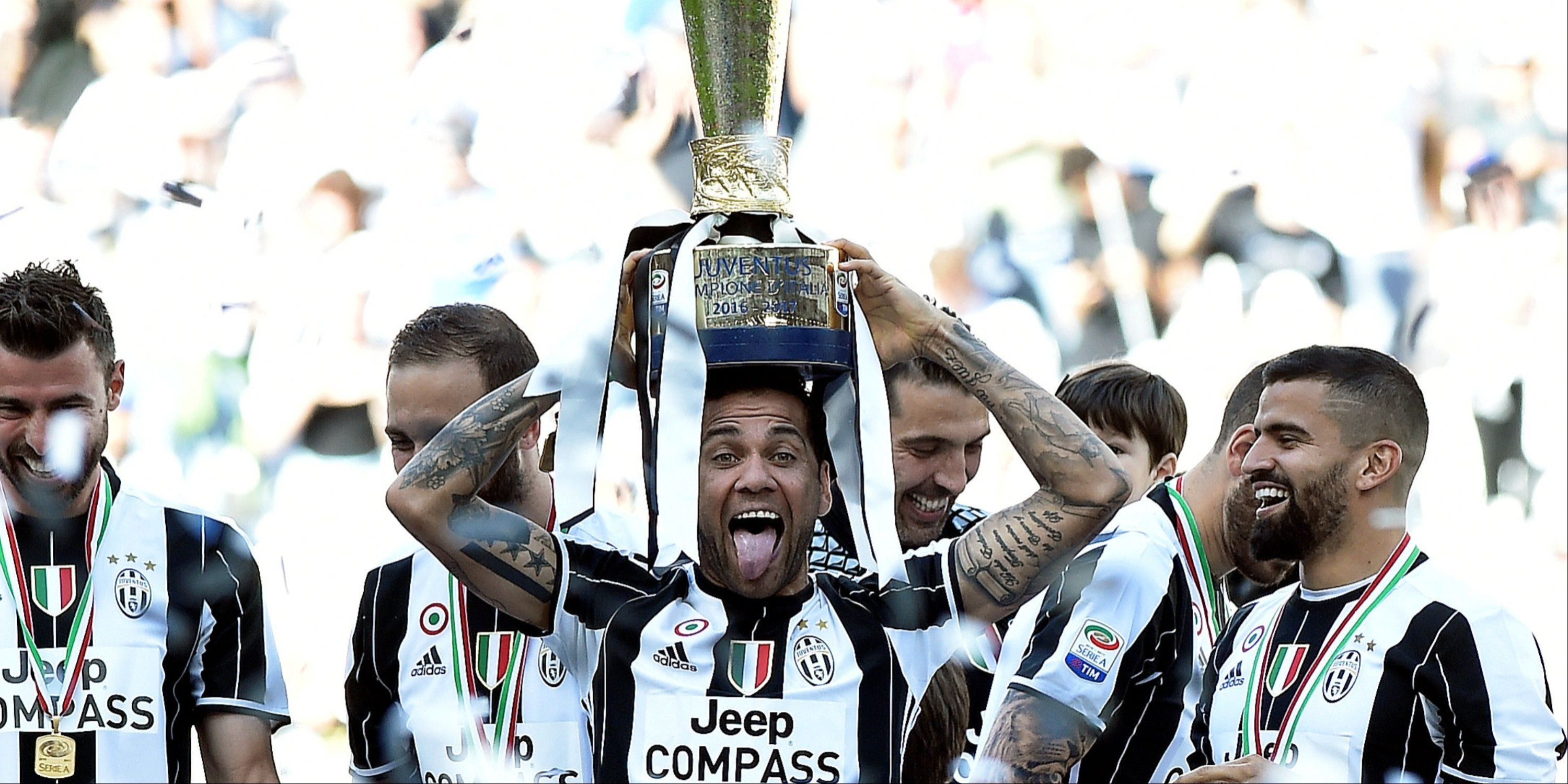 Dani Alves with a trophy