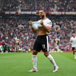 Mohamed Salah celebrates scoring for Liverpool