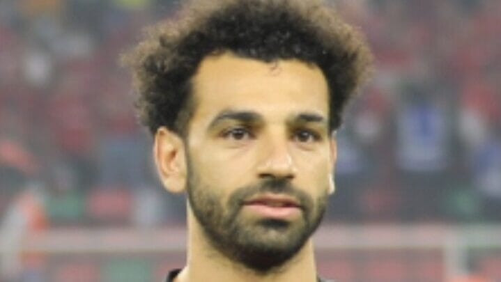 Mohamed Salah in action for Liverpool, a top name among the highest paid Premier League players.