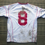 muddy football shirt