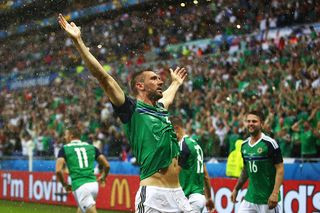 Gareth McAuley celebrating a goal