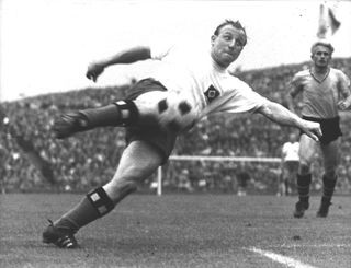 Uwe Seeler in action for Hamburg during the 1960s The star of German football in the 1960s
