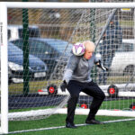 Boris Johnson donned the gloves for a warm up before the Hazel Grove United JFC vs Poynton Juniors girls match in 2019, showing his engagement with the sport at a grassroots level