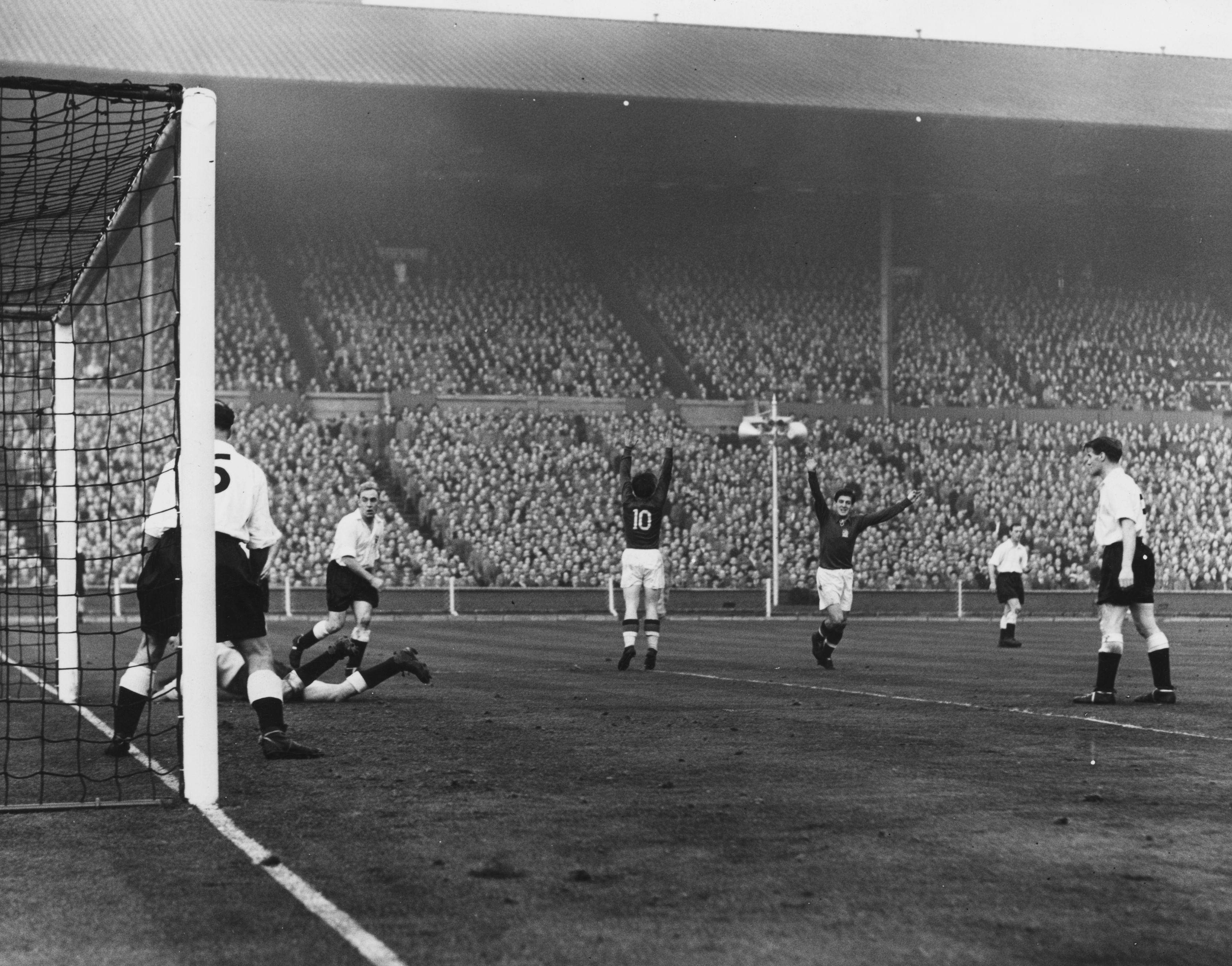 Ferenc Puskas celebrates scoring against England