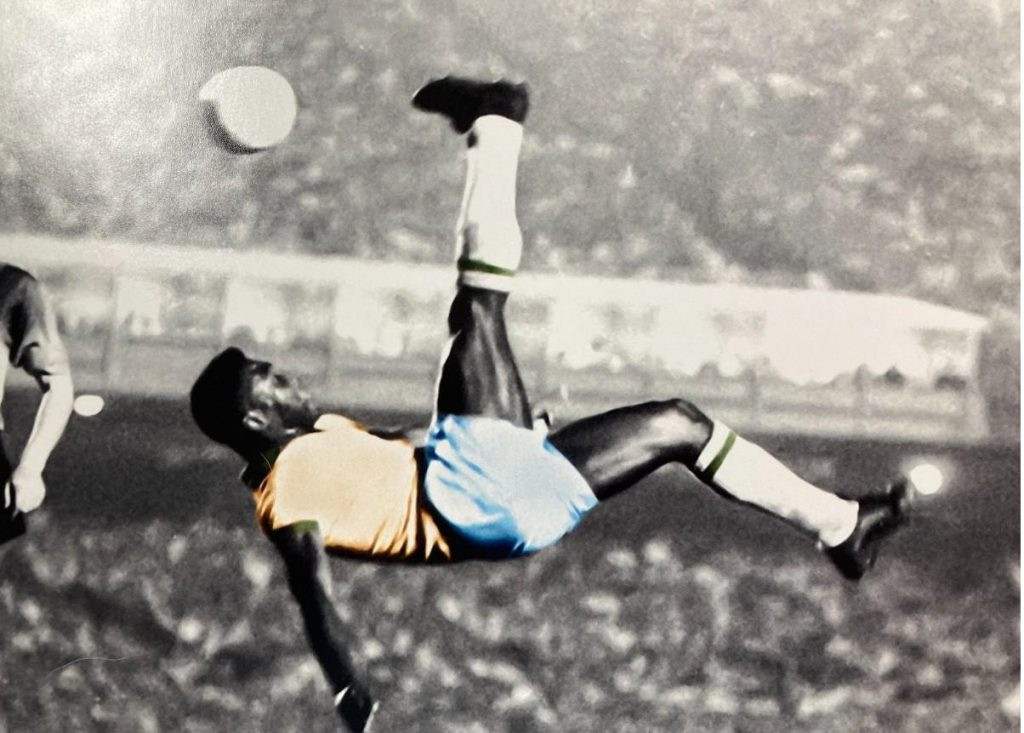 Pele executing an iconic bicycle kick with the Brazil National Team