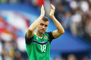 Aaron Hughes in action for Northern Ireland