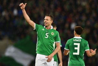 Jonny Evans defending for Northern Ireland