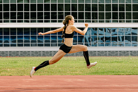 woman athlete running