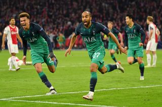 Dele Alli and Lucas Moura celebrate Tottenham’s third goal against Ajax
