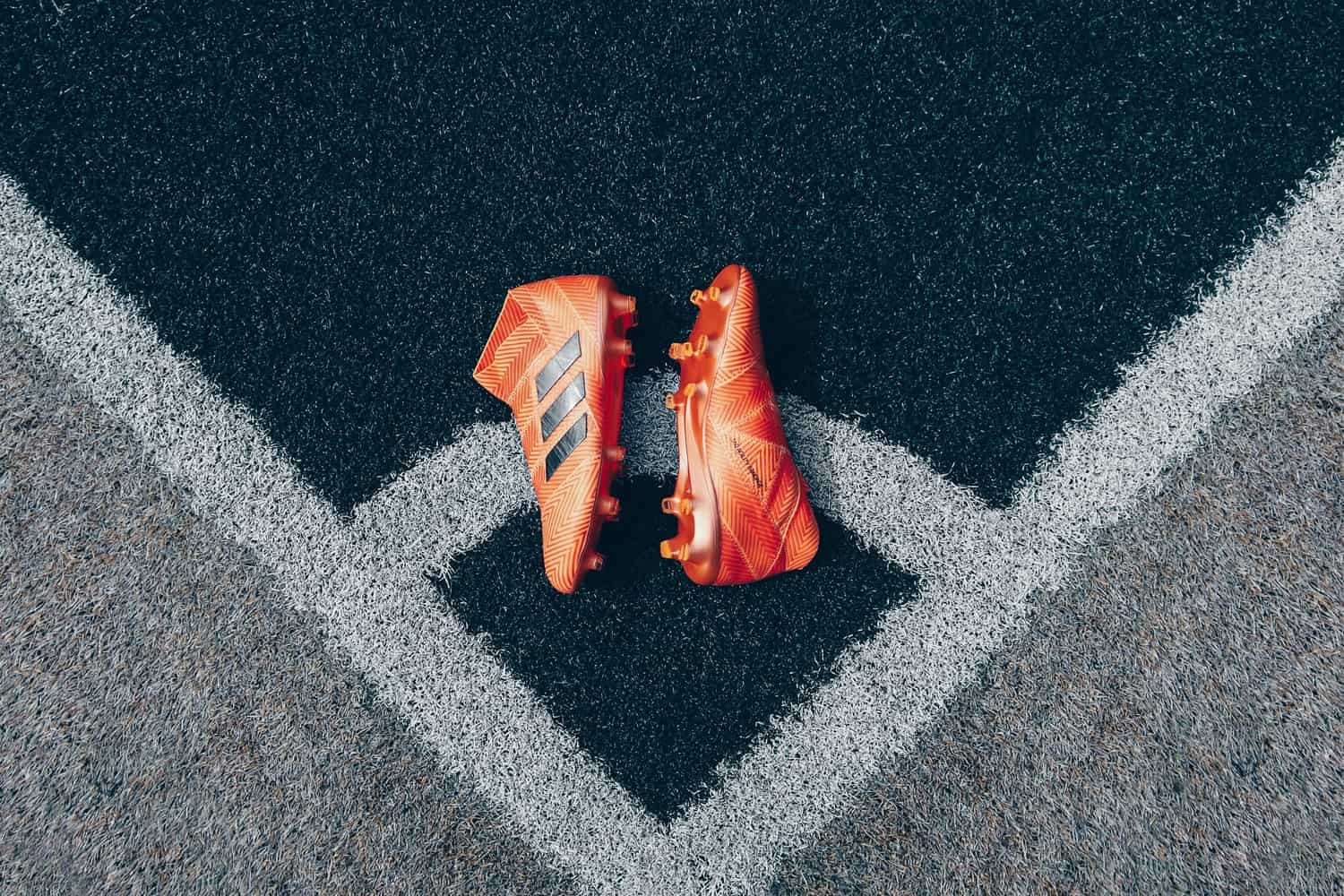 Loosening the laces on football boots for better fit