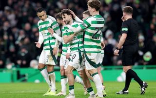 GLASGOW, SCOTLAND - JANUARY 05: Nicolas Kuehn of Celtic celebrates with teammates after scoring his team