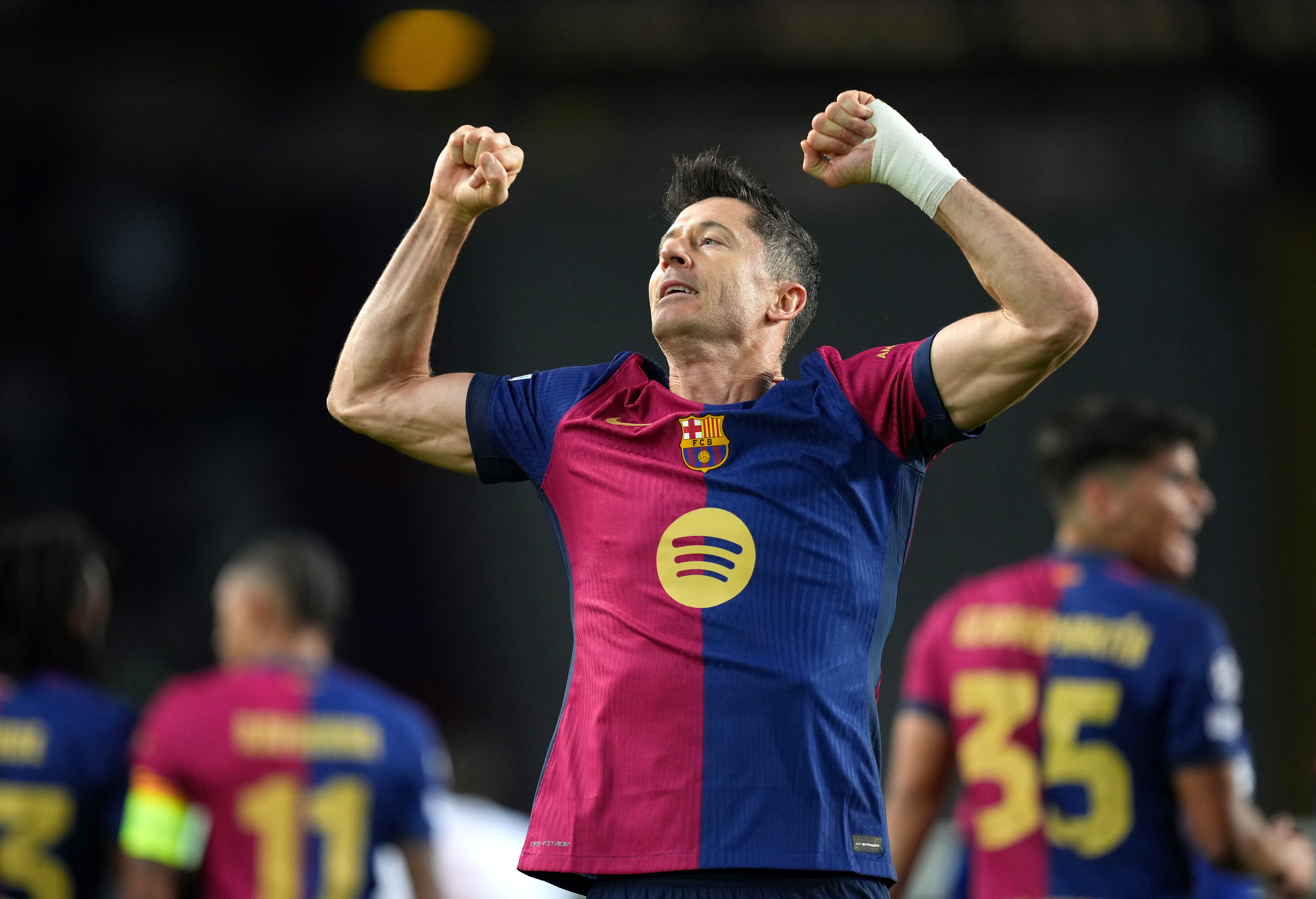 Robert Lewandowski celebrates scoring for Barcelona