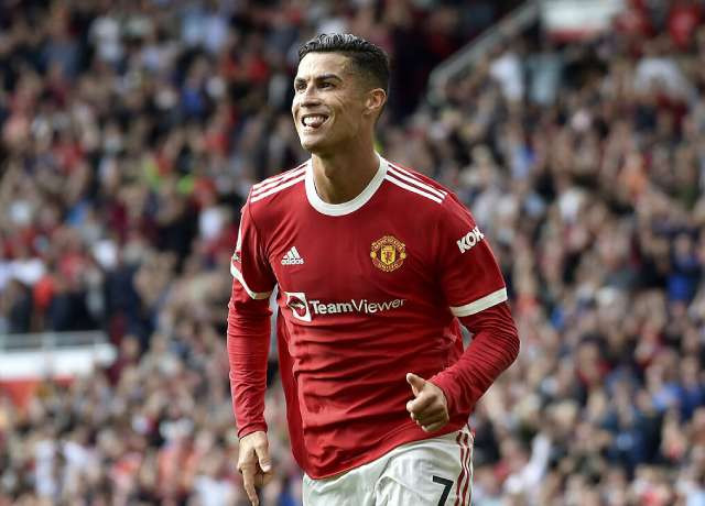 Cristiano Ronaldo wearing a Manchester United jersey