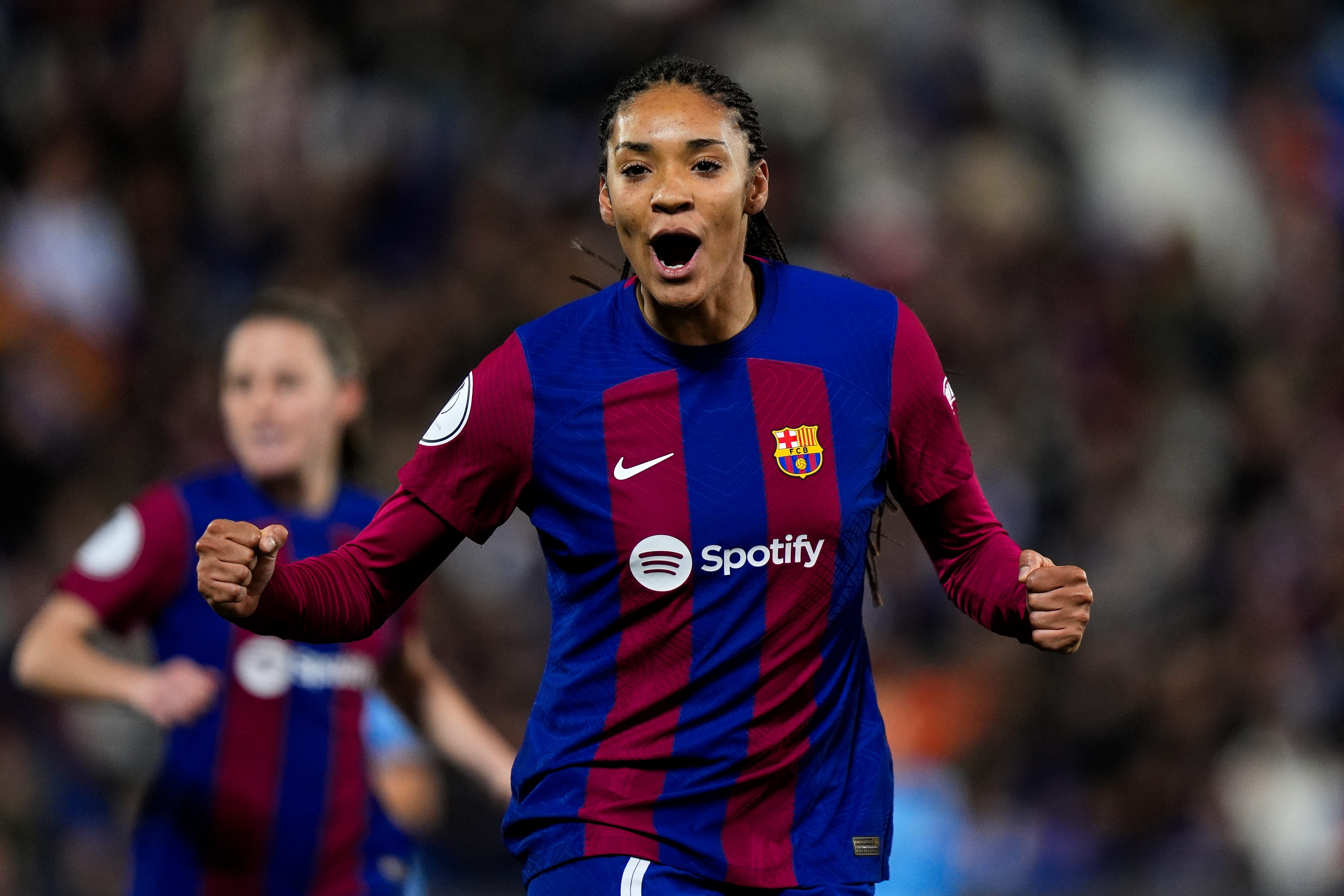 Salma Paralluelo clenches her fists to celebrate a goal for Barcelona