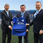 Ian Davidson Commercial Director Score Group, Scott Will Managing Director Score Europe and Gordon Ronaldson CEO Score Group proudly displaying the new Peterhead Football Club shirt