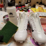 Use a scotch bright pad with acetone to begin preparing the surface.
