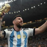 Lionel Messi of Argentina celebrates with the FIFA World Cup Qatar 2022 Winner