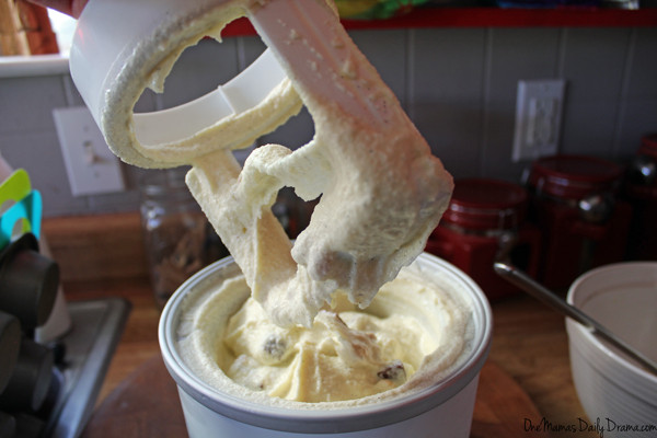 the center paddle being pulled out of the ice cream maker