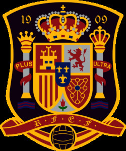 Spanish National Football Team Logo - Depicts the team's crest with red, gold, dark blue, and black elements, symbolizing the team's heritage and passion.