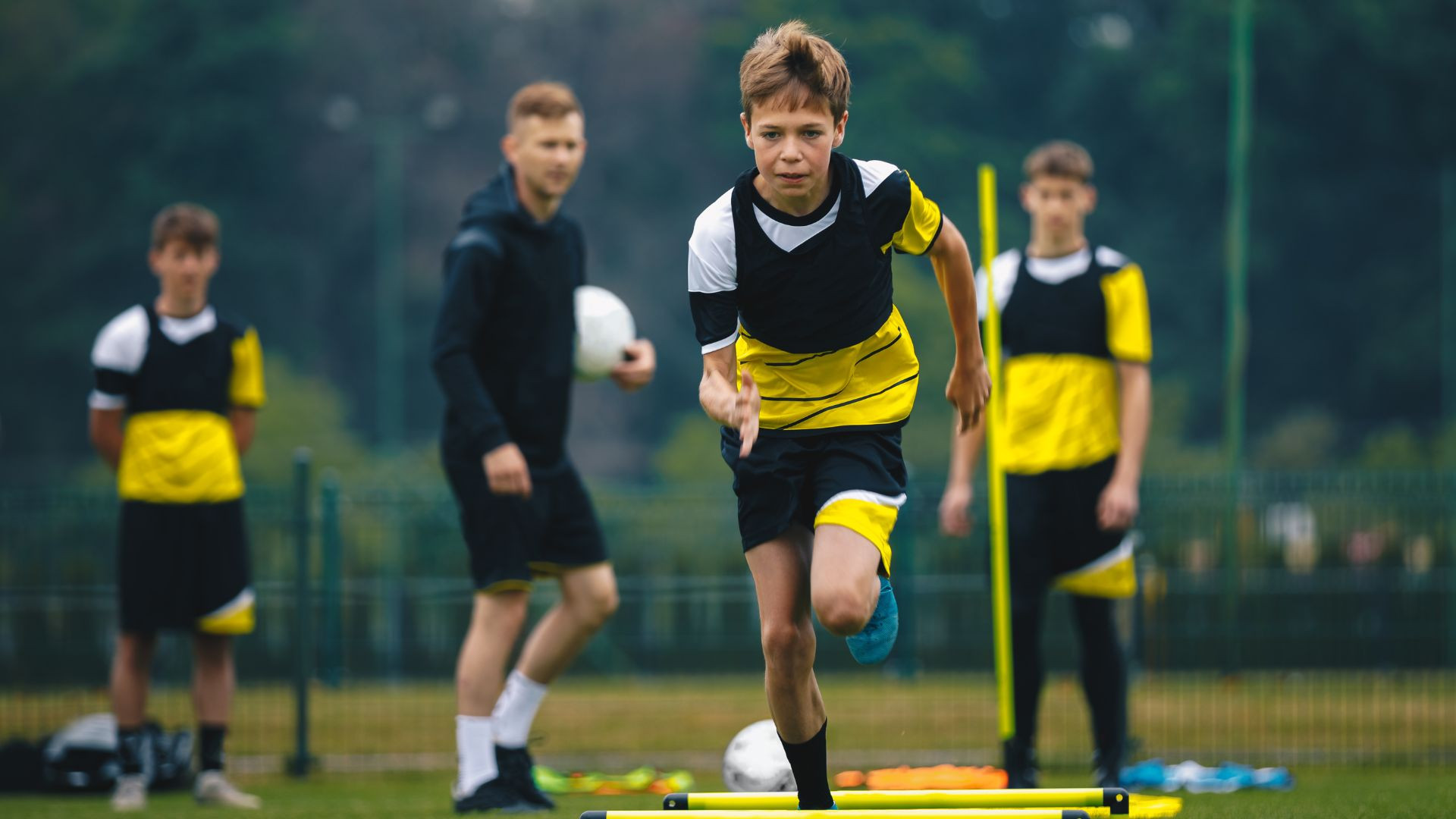 Football player sprinting on the field