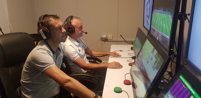 The assistant video assistant referees are charged with monitoring various aspects of the game and reporting to the Video Assistant Referee (VAR). The VAR then reports to the referee on the ground, who may overturn a decision, hold firm, or look at the footage themself on a pitchside display