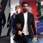 women and man football star carrying small hand bag