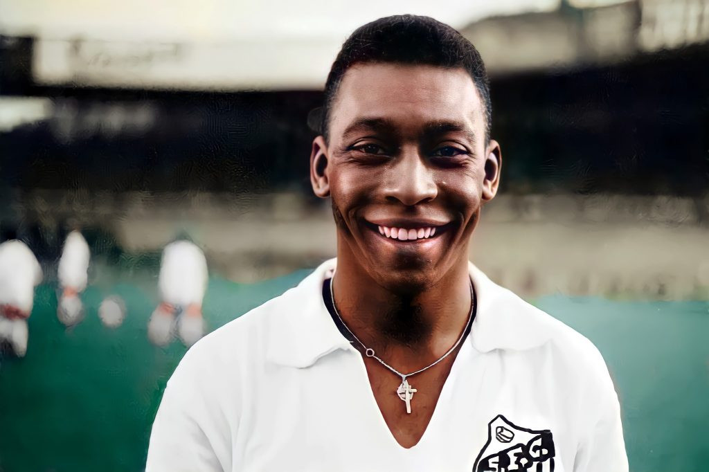 Smiling young Pelé posing for a colour picture in Santos FC jersey