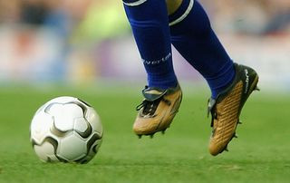 Wayne Rooney wearing a pair of Umbro Zypro in 2002