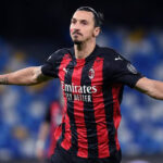 Zlatan Ibrahimovic smiling on the field during a match