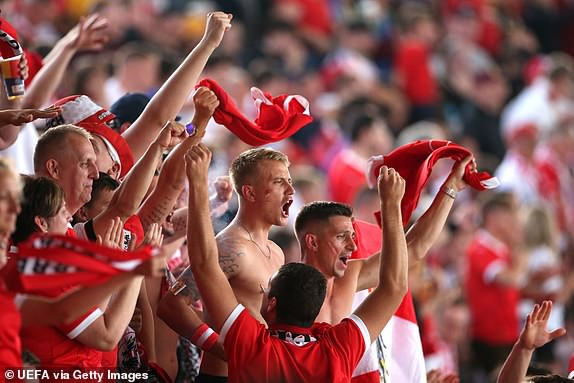 Celebrating fans during the UEFA EURO 2024 group stage match between Poland and Austria