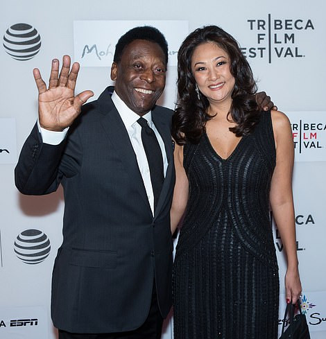Pele and his wife Marcia Aoki pictured at the world premiere of 