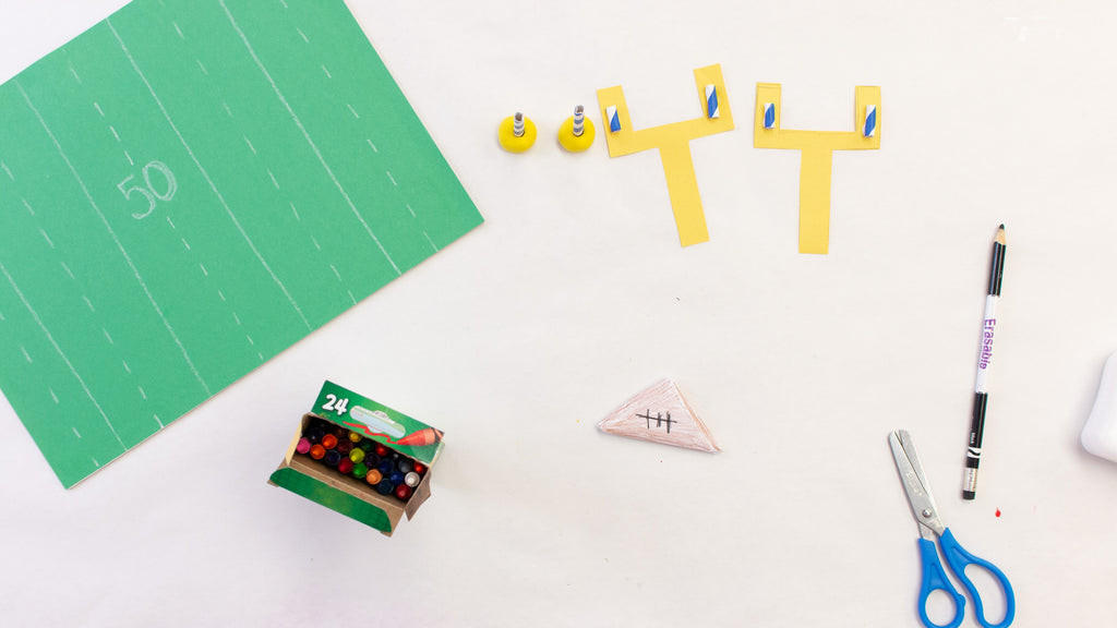 Adding realistic details such as stitching to the paper football