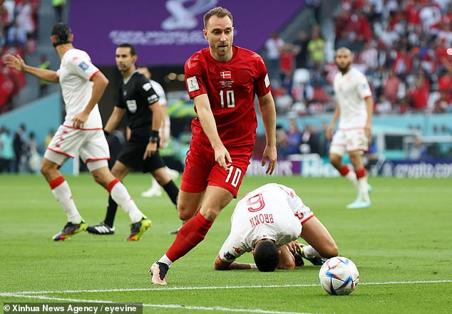 Christian Eriksen during a match, showcasing his return to professional football