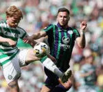 Mykola Kuharevich challenges a Celtic player for the ball in a game for Hibernian