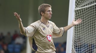 Gary O of Portsmouth wearing the gold third kit