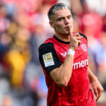 Florian Wirtz celebrates a goal for Bayer Leverkusen