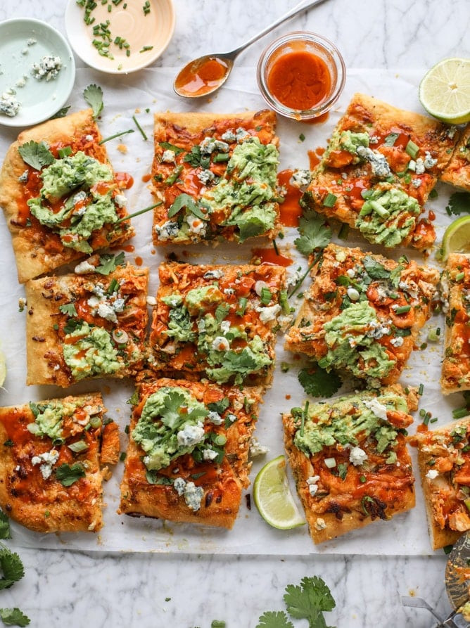 Buffalo chicken guacamole pizza