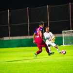 Soccer Player Kicking Ball with Left Foot