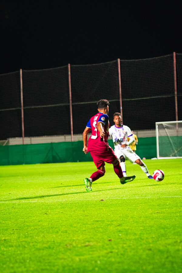 Soccer Player Kicking Ball with Left Foot