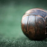 close up of old style leather football.
