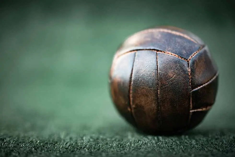 close up of old style leather football.